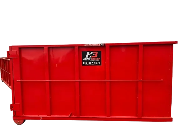 Side view of a red Honey Badger 14 yard dumpster rental bin